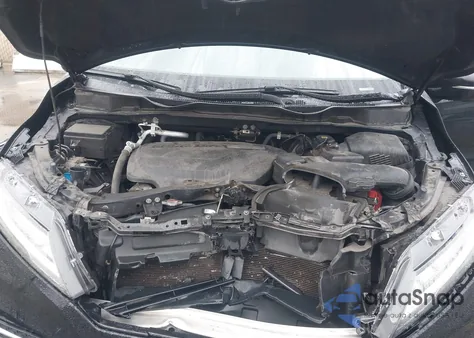 2018 Honda Odyssey Elite z USA, uszkodzony, nr VIN 5FNRL6H97JB092747